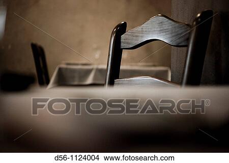 Picture - Wooden chair in restaurant, Spain. Fotosearch