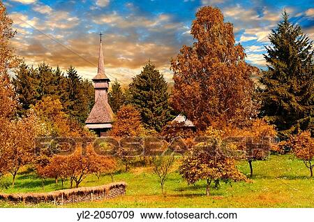 Wooden church on Dobaies in autumn. The Village museum near Sighlet, Maramures, Northern Transylvania. View Large Photo Image Stock Photo - Wooden church on Dobaies in autumn. The Village museum near Sighlet, Maramures, Northern Transylvania.. Fotosearch