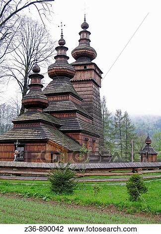Stock Image - Wooden Orthodox Church in Kwiaton, Poland. Fotosearch