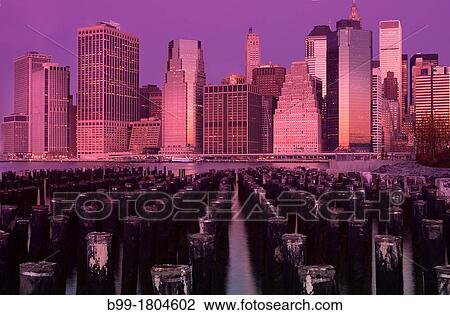 WOODEN PILINGS DOWNTOWN SKYLINE EAST RIVER MANHATTAN NEW YORK CITY USA View Large Photo Image Stock Image - WOODEN PILINGS DOWNTOWN SKYLINE EAST RIVER MANHATTAN NEW YORK CITY USA. Fotosearch