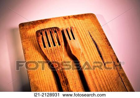 Wooden spatula and fork on a wooden surface. View Large Photo Image Stock Image - Wooden spatula and fork on a wooden surface.. Fotosearch