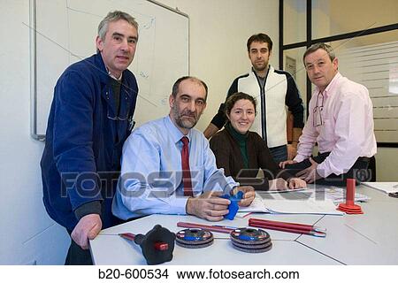 Work team meeting. Manual tools. View Large Photo Image Picture - Work team meeting. Manual tools.. Fotosearch