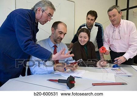 Work team meeting. Watching chisels. Manual tool. View Large Photo Image Stock Image - Work team meeting. Watching chisels. Manual tool.. Fotosearch