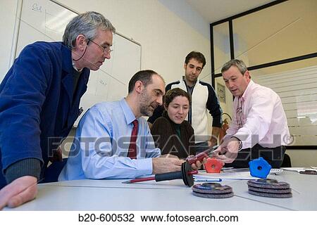 Work team meeting. Watching chisels. Manual tool. View Large Photo Image Stock Image - Work team meeting. Watching chisels. Manual tool.. Fotosearch