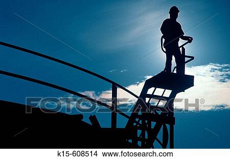Worker at petrochemical oil refinery View Large Photo Image Picture - Worker at petrochemical oil refinery. Fotosearch