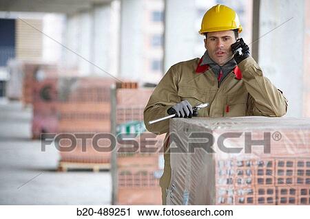 Worker. Housing construction, apartments. San Sebastian, Gipuzkoa, Euskadi. Spain. View Large Photo Image Stock Image - Worker. Housing construction, apartments. San Sebastian, Gipuzkoa, Euskadi. Spain.. Fotosearch