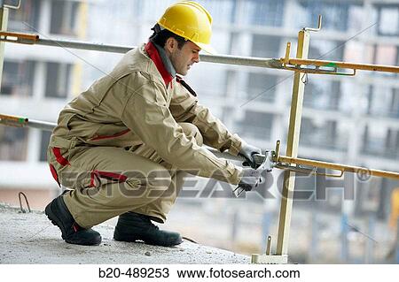 Worker. Housing construction, apartments. San Sebastian, Gipuzkoa, Euskadi. Spain. View Large Photo Image Stock Image - Worker. Housing construction, apartments. San Sebastian, Gipuzkoa, Euskadi. Spain.. Fotosearch