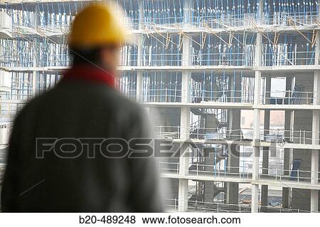 Worker. Housing construction, apartments. San Sebastian, Gipuzkoa, Euskadi. Spain. View Large Photo Image Stock Photo - Worker. Housing construction, apartments. San Sebastian, Gipuzkoa, Euskadi. Spain.. Fotosearch