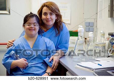 Worker with Down syndrome, sterilization area, biopharmaceutical lab, Grupo Genetrix, Madrid View Large Photo Image Stock Image - Worker with Down syndrome, sterilization area, biopharmaceutical lab, Grupo Genetrix, Madrid. Fotosearch