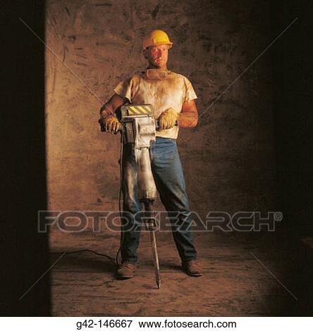 Stock Photo - Worker with jackhammer. Fotosearch