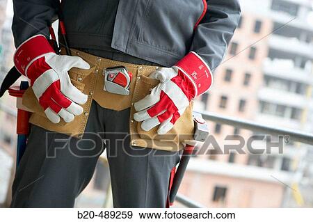 Worker with tools and safety equipment. View Large Photo Image Stock Photo - Worker with tools and safety equipment.. Fotosearch