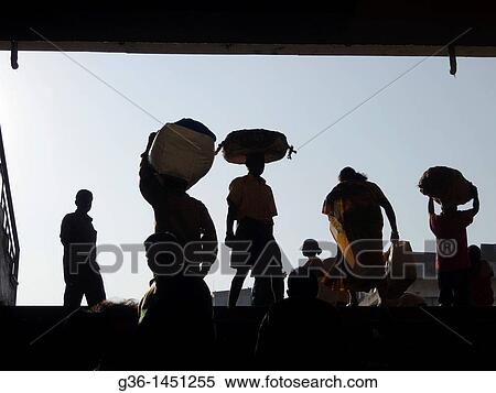 Workers and shopper in City Market in Bangalore, Karnataka, India View Large Photo Image Stock Photography - Workers and shopper in City Market in Bangalore, Karnataka, India. Fotosearch