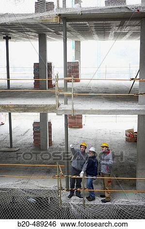 Workers. Housing construction, apartments. San Sebastian, Gipuzkoa, Euskadi. Spain. View Large Photo Image Stock Photograph - Workers. Housing construction, apartments. San Sebastian, Gipuzkoa, Euskadi. Spain.. Fotosearch