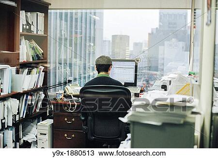 Stock Image - Workers in the office of Credit Suisse First Boston CSFB, a leading stockbroker and investment bank. Fotosearch