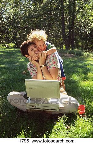 Working mom and son View Large Photo Image Stock Photography - Working mom and son. Fotosearch
