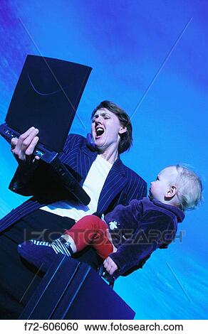 Stock Image - Working mother. Fotosearch