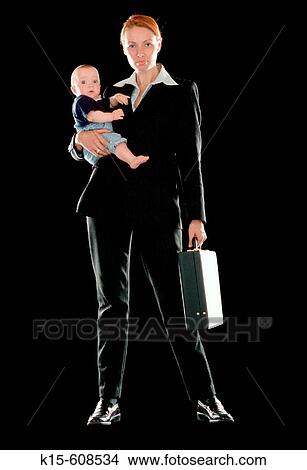 Working mother with briefcase holding baby.. View Large Photo Image Picture - Working mother with briefcase holding baby... Fotosearch