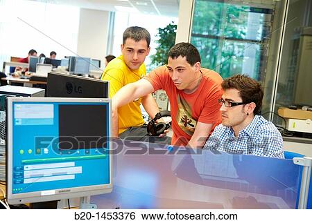 Working on digital TV project, digital TV and multimedia services, Vicomtech-IK4 Visual Interaction and Communication Technologies Centre, applied research centre for Interactive Computer Graphics and Multimedia, San Sebastian Technology Park View Large Photo Image Stock Photograph - Working on digital TV project, digital TV and multimedia services, Vicomtech-IK4 Visual Interaction and Communication Technologies Centre, applied research centre for Interactive Computer Graphics and Multimedia, San Sebastian Technology Park. Fotosearch