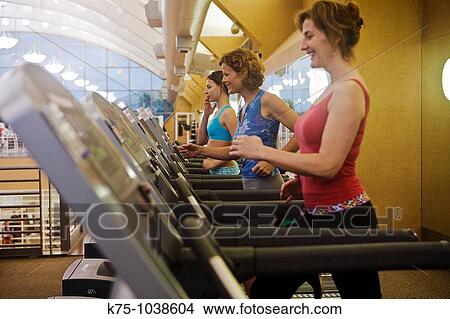 working out on cardiovascular machines View Large Photo Image Picture - working out on cardiovascular machines. Fotosearch