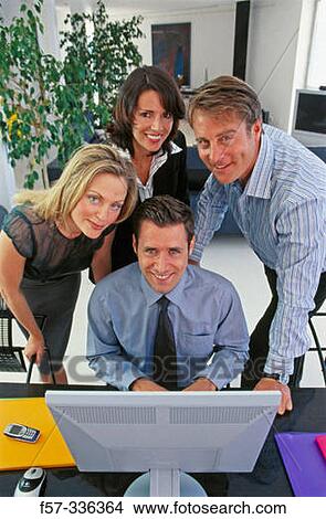 Picture - Working team. Fotosearch