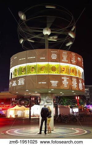 World clock or Weltzeituhr in Berlin at night, couple View Large Photo Image Stock Photography - World clock or Weltzeituhr in Berlin at night, couple. Fotosearch