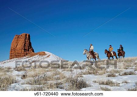 Wranglers herding horses in winter, Shell, Wyoming. Usa View Large Photo Image Stock Image - Wranglers herding horses in winter, Shell, Wyoming. Usa. Fotosearch