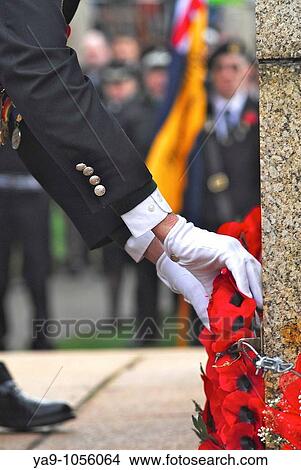 Wreath laying at Remembrance day service in the UK View Large Photo Image Picture - Wreath laying at Remembrance day service in the UK. Fotosearch