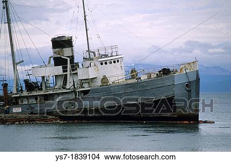 Wreck in front of the Ushuaia harbour, the southernmost city in the world, Patagonia, Argentina, South America View Large Photo Image Picture - Wreck in front of the Ushuaia harbour, the southernmost city in the world, Patagonia, Argentina, South America. Fotosearch