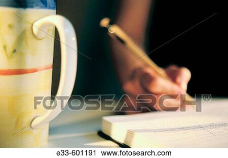 Writing in journal View Large Photo Image Stock Image - Writing in journal. Fotosearch
