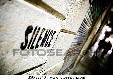 Writing on the wall, asking for silence. Barcelona, Barri Gotic View Large Photo Image Picture - Writing on the wall, asking for silence. Barcelona, Barri Gotic. Fotosearch