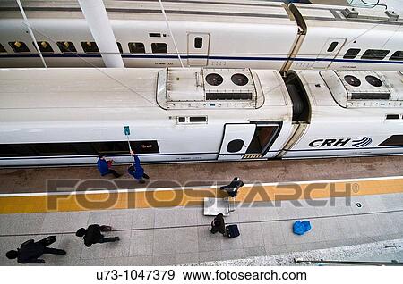 Wuhan railway station. a view of the super fast bullet train moments before it departure to Guangzhou. View Large Photo Image Stock Photo - Wuhan railway station. a view of the super fast bullet train moments before it departure to Guangzhou.. Fotosearch