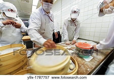 Xiao Lung Bao or Soup Dumplings, being prepared at the world famous Din Tai Fung in Taipei, Taiwan View Large Photo Image Stock Photo - Xiao Lung Bao or Soup Dumplings, being prepared at the world famous Din Tai Fung in Taipei, Taiwan. Fotosearch