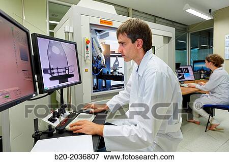 Stock Photo - XTH 225. Computed tomography system. Industrial X-ray. Technicians inspect the internal structure and porosity of the material of a component. Innovative Metrology applied. Sariki Metrology. Elgoibar. Gipuzkoa. Basque Country. Spain.. Fotosearch
