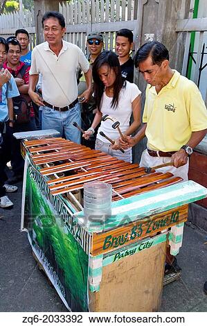 Xylophone Players in the Streets of Malate in Metro Manila, Philippines. View Large Photo Image Stock Image - Xylophone Players in the Streets of Malate in Metro Manila, Philippines.. Fotosearch