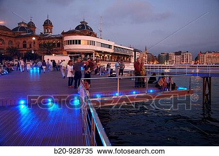 Yacht club viewpoint in the evening, La Concha bay, San Sebastian, Donostia, Gipuzkoa, Basque Country, Spain View Large Photo Image Stock Photography - Yacht club viewpoint in the evening, La Concha bay, San Sebastian, Donostia, Gipuzkoa, Basque Country, Spain. Fotosearch