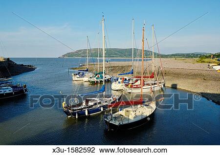 Yachts in the harbour at Porlock Weir in summer, Exmoor National Park, Somerset, England, United Kingdom View Large Photo Image Stock Image - Yachts in the harbour at Porlock Weir in summer, Exmoor National Park, Somerset, England, United Kingdom. Fotosearch