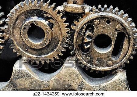 Yangshou (China): detail of a sculpture made with gears outside a bar along the Walking Street View Large Photo Image Stock Photo - Yangshou (China): detail of a sculpture made with gears outside a bar along the Walking Street. Fotosearch