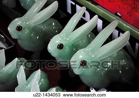 Yangshou (China): jade souvenirs, rabbit-shaped, sold along the Walking Street in occasion of the Rabbit Year View Large Photo Image Stock Image - Yangshou (China): jade souvenirs, rabbit-shaped, sold along the Walking Street in occasion of the Rabbit Year. Fotosearch