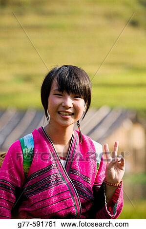Yao minority girl. Longsheng terraced rice fields. Guilin. Guangxi Province. China. View Large Photo Image Stock Image - Yao minority girl. Longsheng terraced rice fields. Guilin. Guangxi Province. China.. Fotosearch