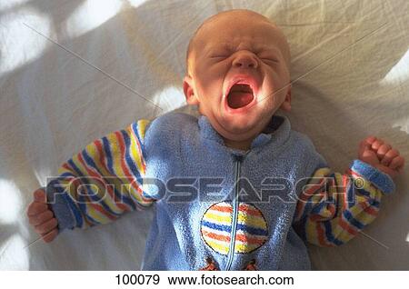 Stock Photo - Yawning baby. Fotosearch