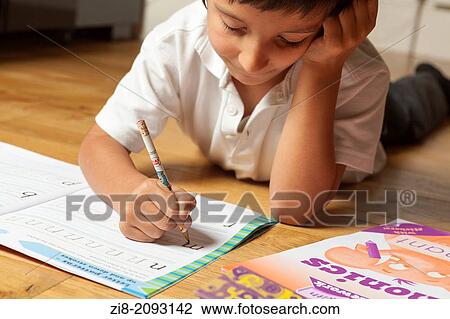 Year one schoolboy learning to write View Large Photo Image Stock Image - Year one schoolboy learning to write. Fotosearch