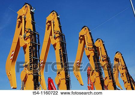 Yellow backhoe arm from new Liebherr excavator View Large Photo Image Stock Image - Yellow backhoe arm from new Liebherr excavator. Fotosearch