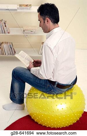 Picture - Yellow balloon in sitting room.. Fotosearch