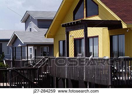 Yellow beach house View Large Photo Image Stock Photo - Yellow beach house. Fotosearch