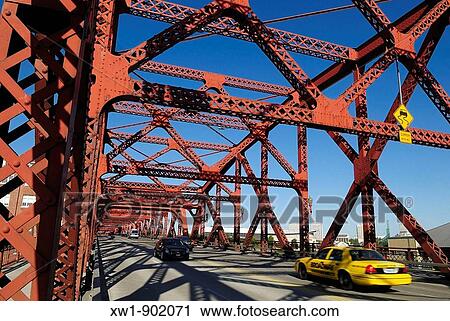 yellow cab and cars crossing a historic steel bridge over Willamette River, Portland, Oregon, USA View Large Photo Image Stock Image - yellow cab and cars crossing a historic steel bridge over Willamette River, Portland, Oregon, USA. Fotosearch