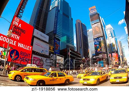 Stock Photograph - yellow cabs at Times square in Manhattan, New York. Fotosearch