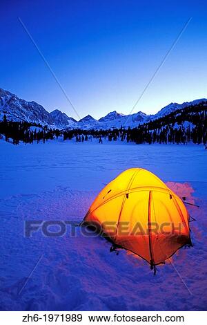 Stock Photo - Yellow dome tent in winter, John Muir Wilderness, Sierra Nevada Mountains, California USA.. Fotosearch