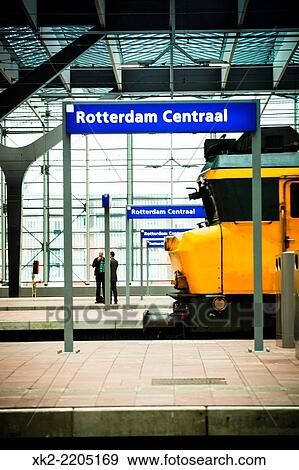 Yellow old dutch train stopped at Rotterdam Centraal, Holland. View Large Photo Image Stock Photo - Yellow old dutch train stopped at Rotterdam Centraal, Holland.. Fotosearch