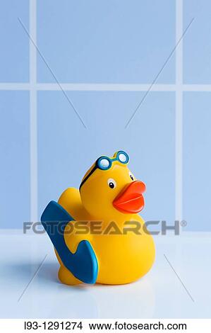 Yellow rubber duck with surfboard View Large Photo Image Picture - Yellow rubber duck with surfboard. Fotosearch
