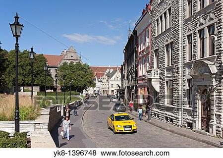 Stock Photo - Yellow Taxi in Old Tallinn, Estonia. Fotosearch